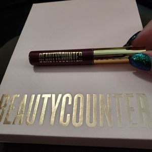 Beautycounter lip gloss...mulberry